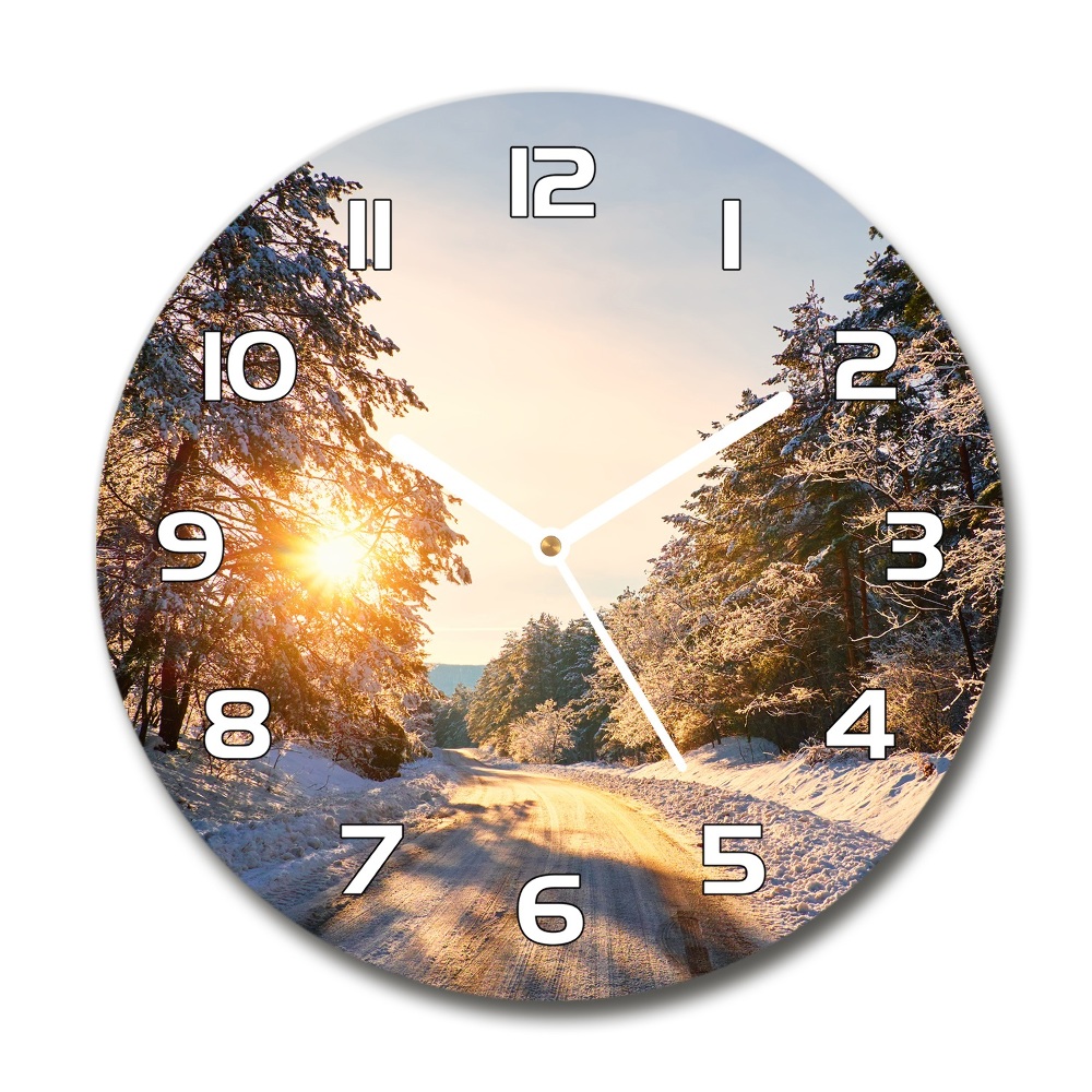 Round wall clock Road in the forest in winter