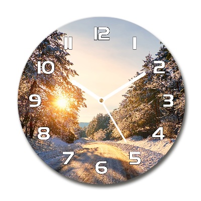 Round wall clock Road in the forest in winter