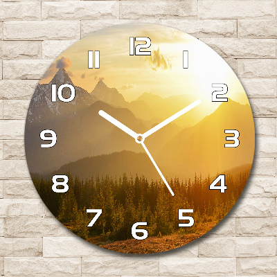 Round glass clock Sunset of the mountain