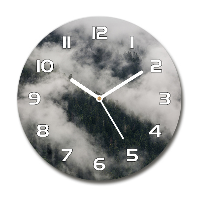 Round wall clock Fog over the forest