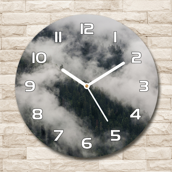 Round wall clock Fog over the forest