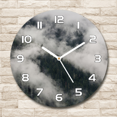 Round wall clock Fog over the forest