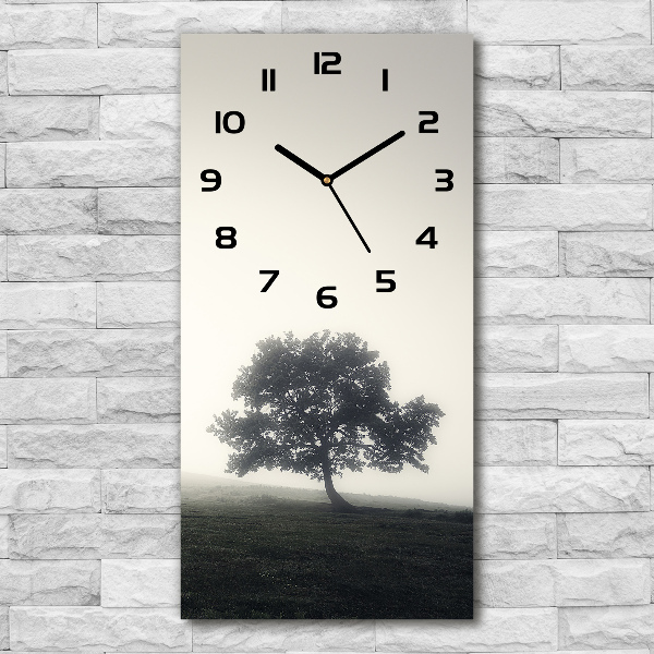 Vertical wall clock Tree in the fog