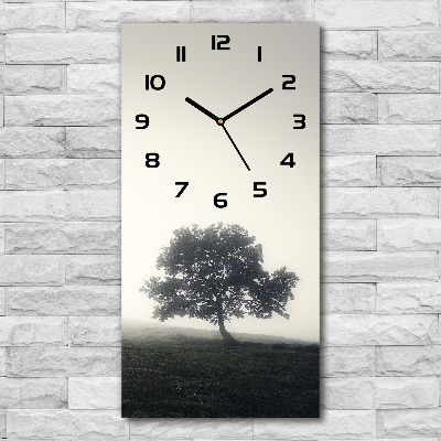 Vertical wall clock Tree in the fog