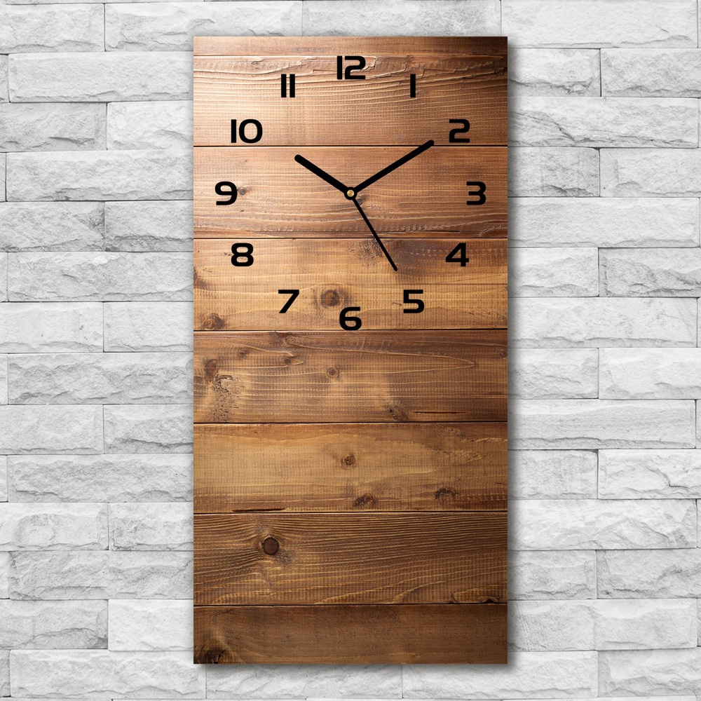 Vertical wall clock Wooden background