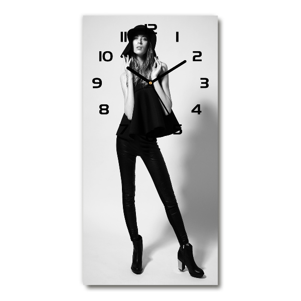 Vertical wall clock A woman in black