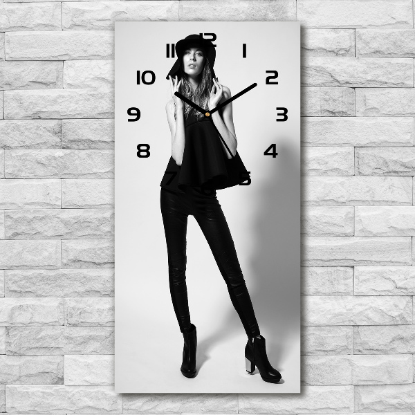 Vertical wall clock A woman in black