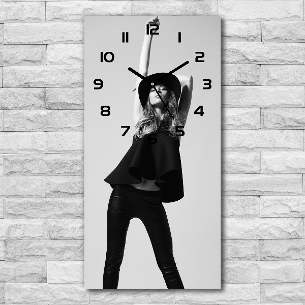 Vertical wall clock A woman in black