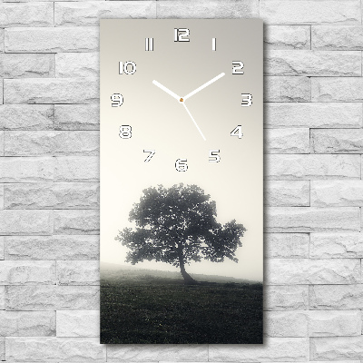 Vertical wall clock Tree in the fog