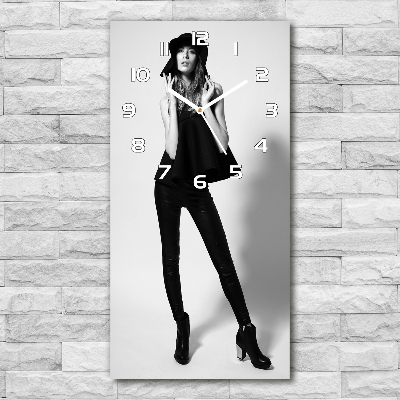 Vertical wall clock A woman in black