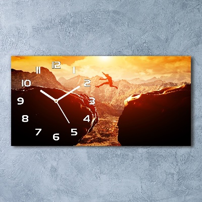 Horizontal wall clock Jump over the abyss