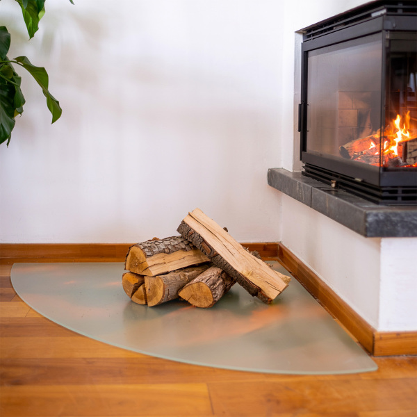 Quarter circle fireplace pad with a matte glass optical effect