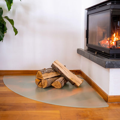 Quarter circle fireplace pad with a matte glass optical effect