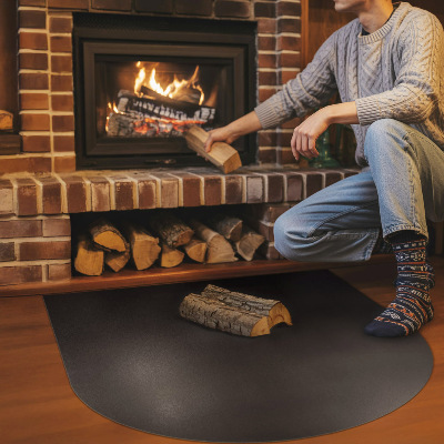 Semi-oval hearth pad for fireplace in industrial metal