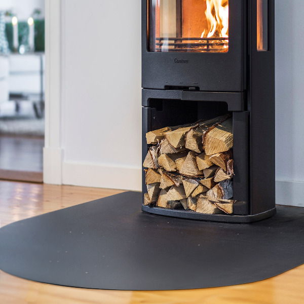 Semi-oval hearth pad for fireplace in industrial metal