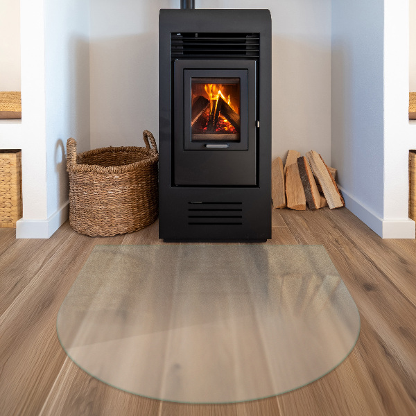 Semi-oval hearth pad for wood stove with a frosted visual effect