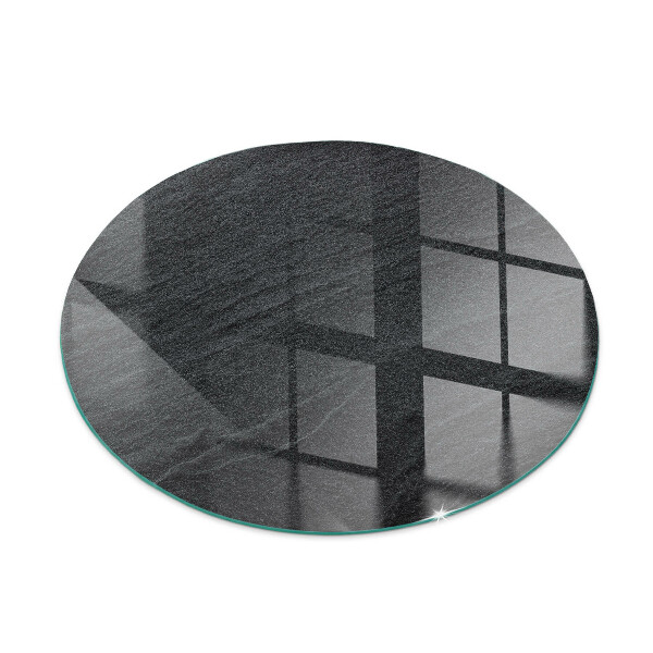 Round glass hearth for log burner Natural stone pattern