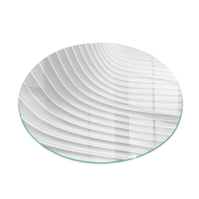 Round glass hearth for log burner Waves of subtle shapes