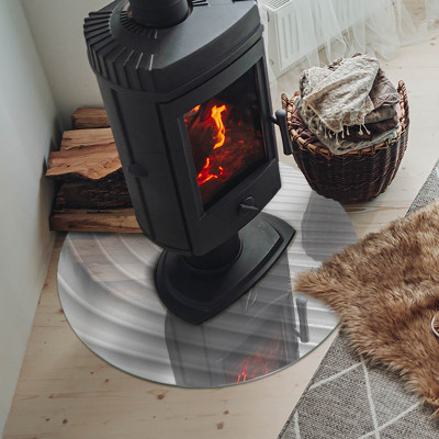 Round glass hearth for log burner Waves of subtle shapes