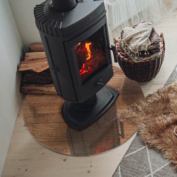 Round glass hearth for log burner Wood-inspired pattern