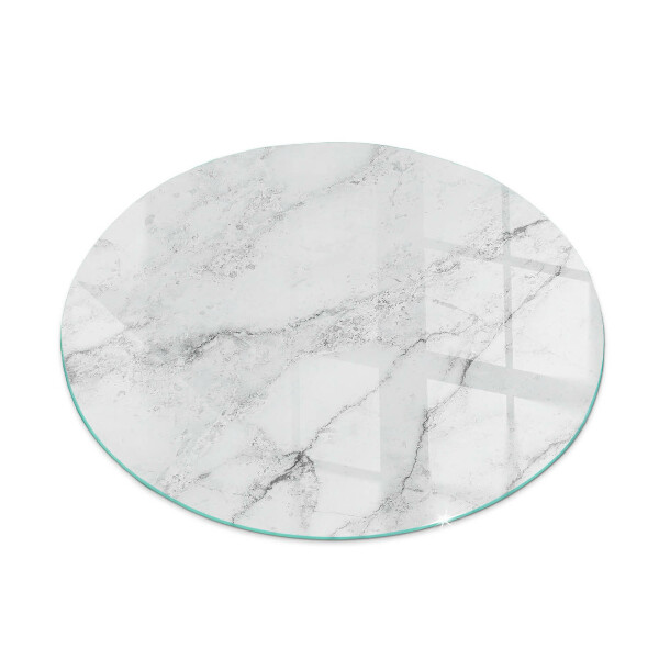 Round glass hearth for log burner Marble accents with delicate veining