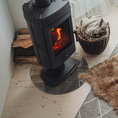 Round glass hearth Perforated steel motif