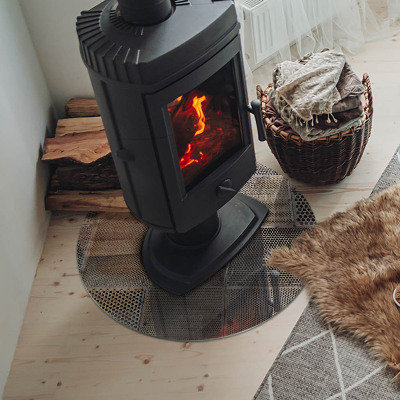 Round glass hearth Perforated steel motif