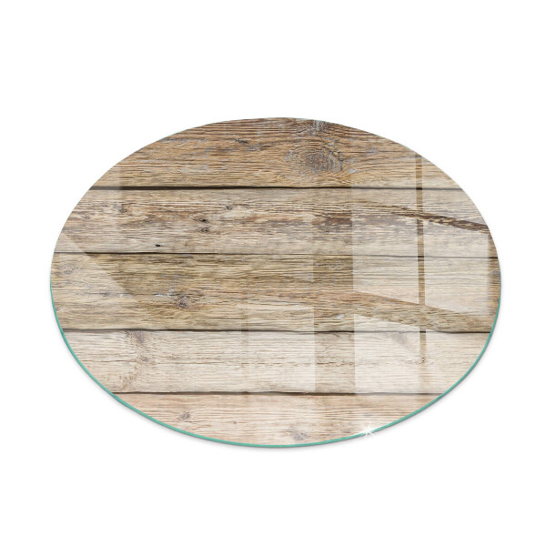 Round glass hearth Wooden mosaic in the layout