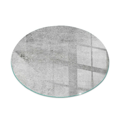 Round glass hearth for log burner Raw concrete pattern