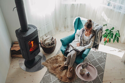 Round glass hearth for log burner Raw concrete pattern