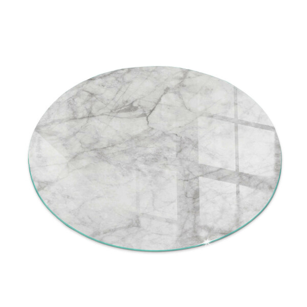 Round glass hearth for log burner Marble texture in an elegant style
