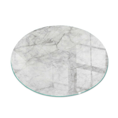 Round glass hearth for log burner Marble texture in an elegant style