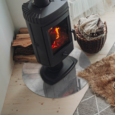 Round glass hearth for log burner Marble texture in an elegant style