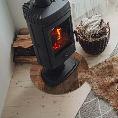 Round tempered glass hearth Rust print on metal surface