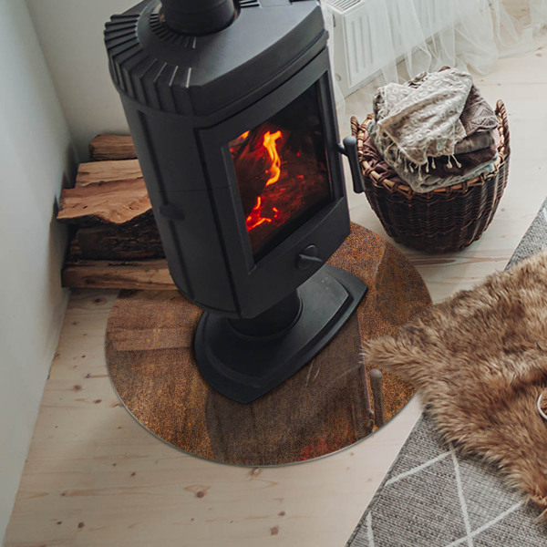 Round tempered glass hearth Rust print on metal surface