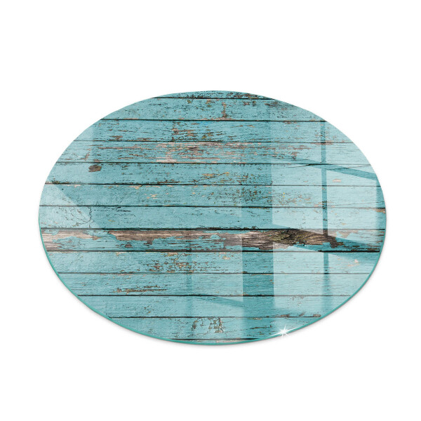 Round glass hearth for log burner Rustic boards in a natural style