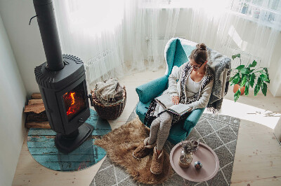 Round glass hearth for log burner Rustic boards in a natural style