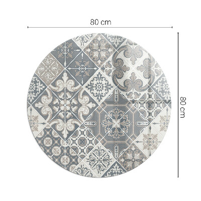 Round glass hearth for log burner Arrangement of mosaic decorations