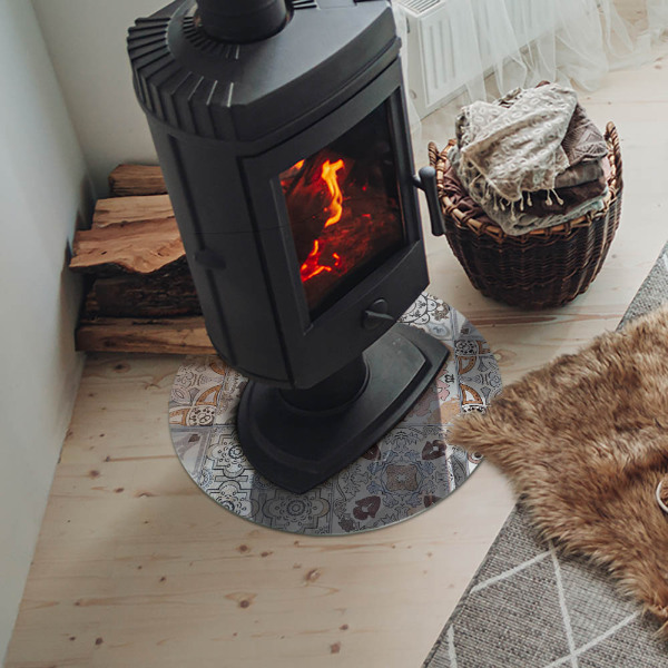 Round glass hearth for log burner Mosaic patterns in tiles