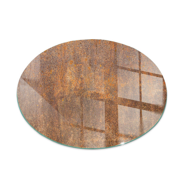 Round tempered glass hearth Rusty pattern on the background