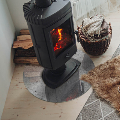 Round glass hearth Raw concrete in a minimalist style