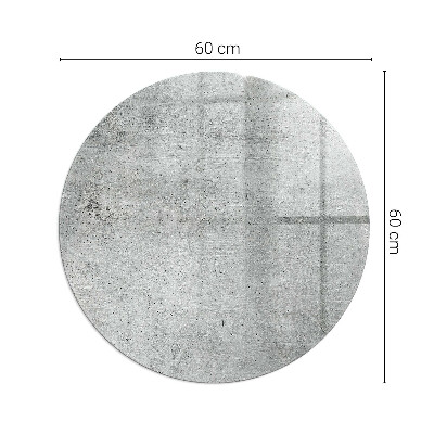 Round glass hearth Raw concrete in a minimalist style