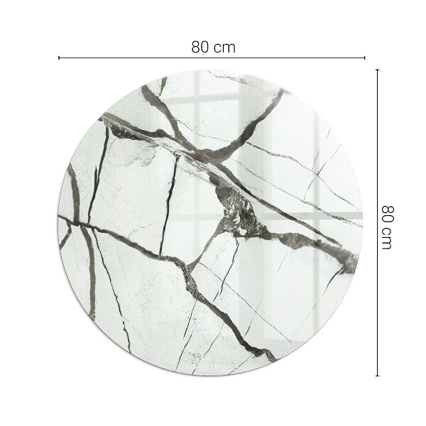 Round glass hearth for log burner Marble veins in an elegant style