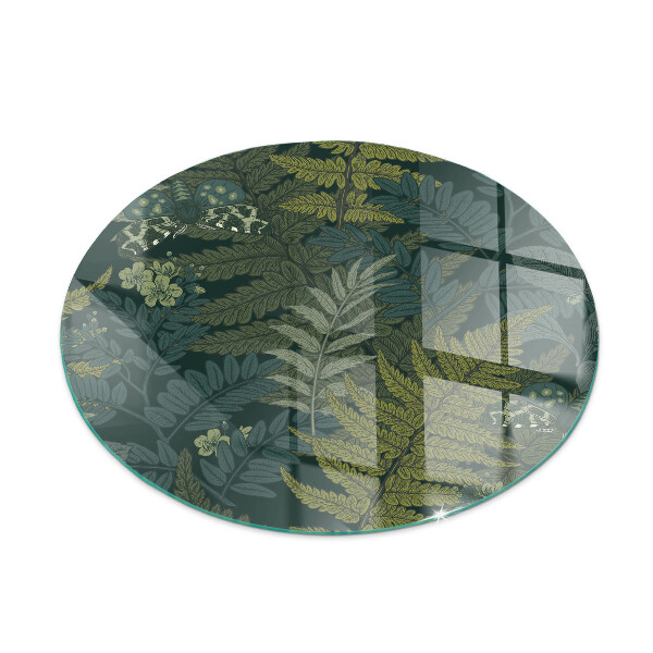 Round glass hearth for log burner Plant patterns with butterflies