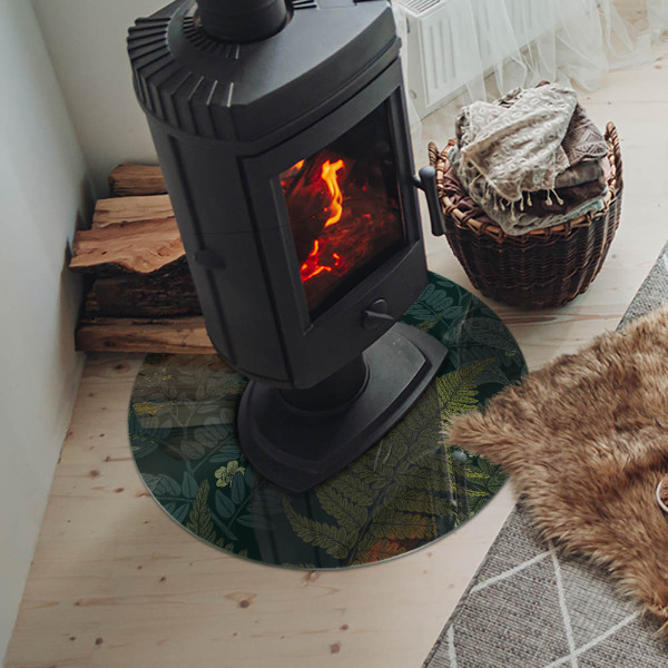 Round glass hearth for log burner Plant patterns with butterflies