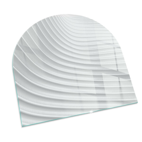 Semi oval glass hearth for stove Waves of subtle shapes