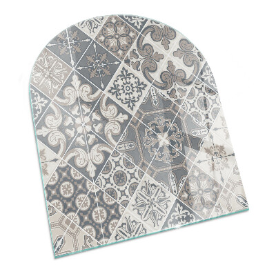 Semi oval glass hearth for stove Arrangement of mosaic decorations