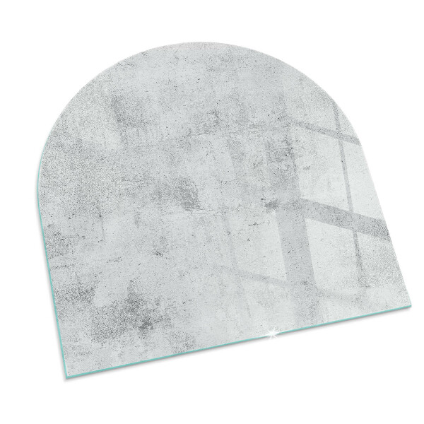 Semi oval glass hearth for stove Concrete texture in a raw style