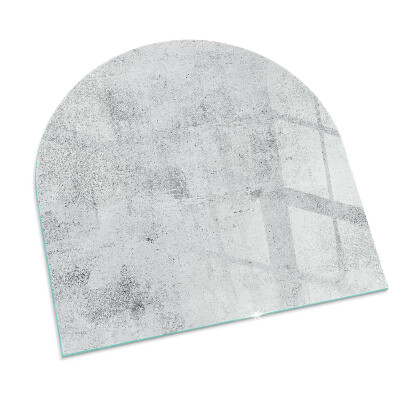 Semi oval glass hearth for stove Concrete texture in a raw style