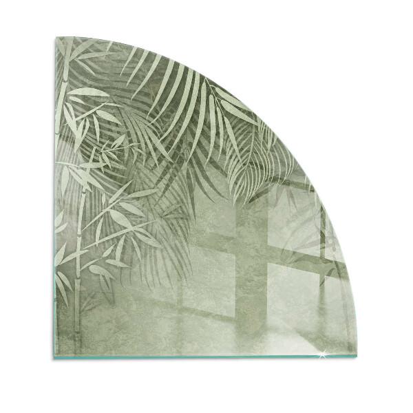 Corner glass hearth Tropical leaves on the background